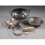 A planished pewter tureen base, a similar dish, loose cutlery, a fish serving set, in case, and