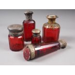 A Victorian gilt metal mounted ruby glass scent bottle, 5" high, a similar smaller scent bottle