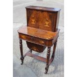 A late 19th century figured walnut and inlaid bonheur de jour/work table, fitted drop front
