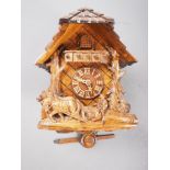 A Black Forest cuckoo clock, 11" high