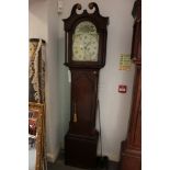 A late Georgian provincial oak long case clock with painted arch top dial and eight-day striking