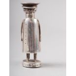 An Edwardian novelty silver pepper shaker, formed as a stylised chauffeur, by Saunders & Shepherd