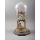 A 400-day clock, under a glass dome shade, 13" high