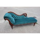 A late 19th century mahogany framed chaise longue, upholstered in a turquoise velour, on turned