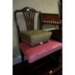 An early 19th century mahogany pierced splat back dining chair with stuffed over seat, upholstered