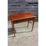 A 19th century mahogany side table, fitted one drawer, on square taper supports, 37" wide x 19" deep