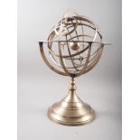 A reproduction brass partly rotating Armillary sphere, on circular stepped base, 20 1/4" high