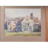 A watercolour of a Tudor house, 9 1/4" x 12", in oak strip frame, and a larger similar
