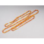 Three butterscotch/egg yolk amber bead necklaces, total weight 51.7g