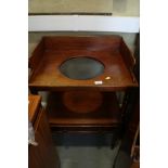 A late 19th century mahogany tray top two-tier washstand, fitted one drawer, on turned supports, 24"