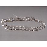 A white metal curb link bracelet, stamped Tiffany & Co 925 and signed Elsa Peretti