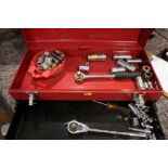 A toolbox containing socket sets, ratchets, etc