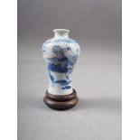 A Chinese blue and white porcelain vase, decorated farmers and warriors, four-character mark to