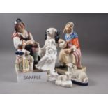 A pair of Staffordshire figures, "The Cobbler and his Wife", 11 3/4" high, another Staffordshire