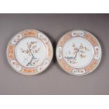 A pair of Chinese Imari porcelain plates with prunus spray decoration, 9" dia (one for restoration)