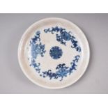 A Chinese crackle glaze shallow dish, decorated in underglaze blue with floral motifs, 8 1/2" dia