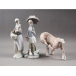 A Lladro horse, 6" high, two Lladro figures, girls with domestic fowl, taller 11" high