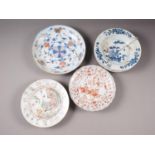 An Imari shallow dish (cracks), 1" dia, a similar plate, four blue and white soup plates (