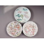 A Chinese famille verte porcelain shallow dish, decorated four boats and figures, four-character