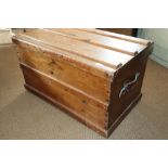 A waxed pine trunk with leather carry handles, 34" wide x 19" deep x 20" high