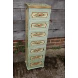 A Venetian style floral painted chest of seven drawers, 12" wide x 7" deep x 38" high