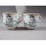 A pair of 20th century Chinese porcelain cups with figure decoration and verses, 23 1/4" high