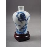 A Chinese blue and white porcelain miniature vase, decorated bird and fish, six-character mark to