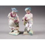 A pair of 19th century "Meissen" figures, "Harvesters", 4 1/2" high, restorations