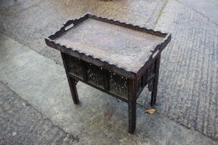 An Indian inlaid hardwood rectangular tray top occasional table, on folding stand