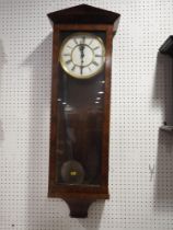 A Vienna type regulator wall clock with figured walnut case, 36" high (no weight)