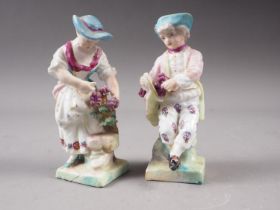 A pair of 19th century "Meissen" figures, "Grape Harvesters", 4 1/2" high, restorations