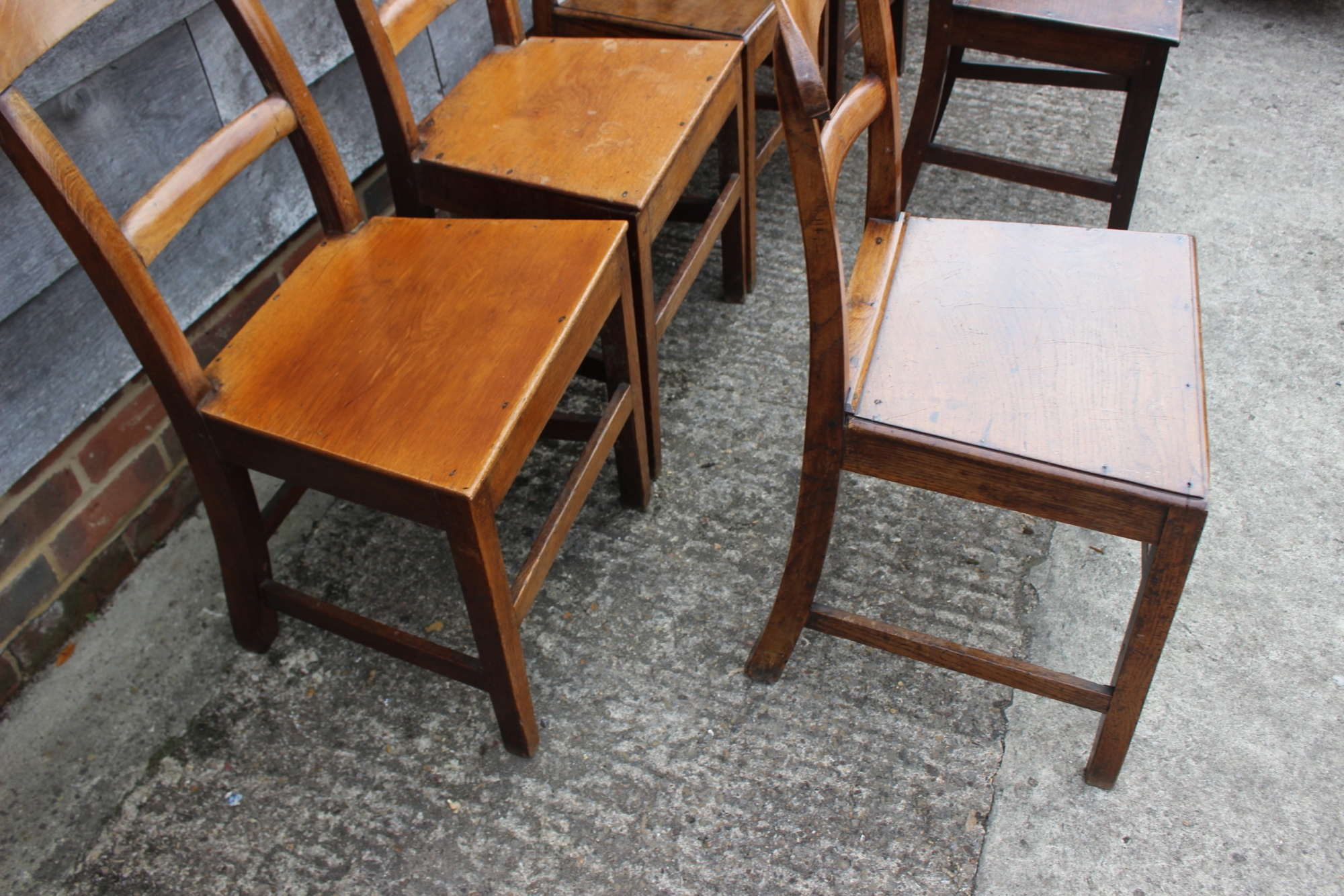 A Harlequin set of six 19th century oak bar back dining chairs with panel seats and stretchered - Image 2 of 3