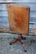 A 19th century walnut rectangular tilt top occasional table, on tripod splay supports, 24" wide x