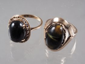 A 9ct gold and tiger's eye dress ring, size N, 7.1g, and another similar, size M, 5.4g