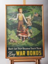 A 1942 issue WWII American "Don't let that shadow touch them" war bonds poster, in strip frame
