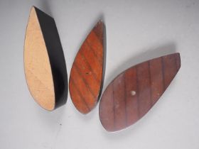 Three sections of a wooden propellor