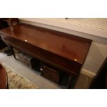 An early 19th century mahogany box and ebony strung square piano case, on reeded castored