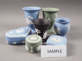 Sixteen Wedgwood jasperware boxes and covers, and other jasperware