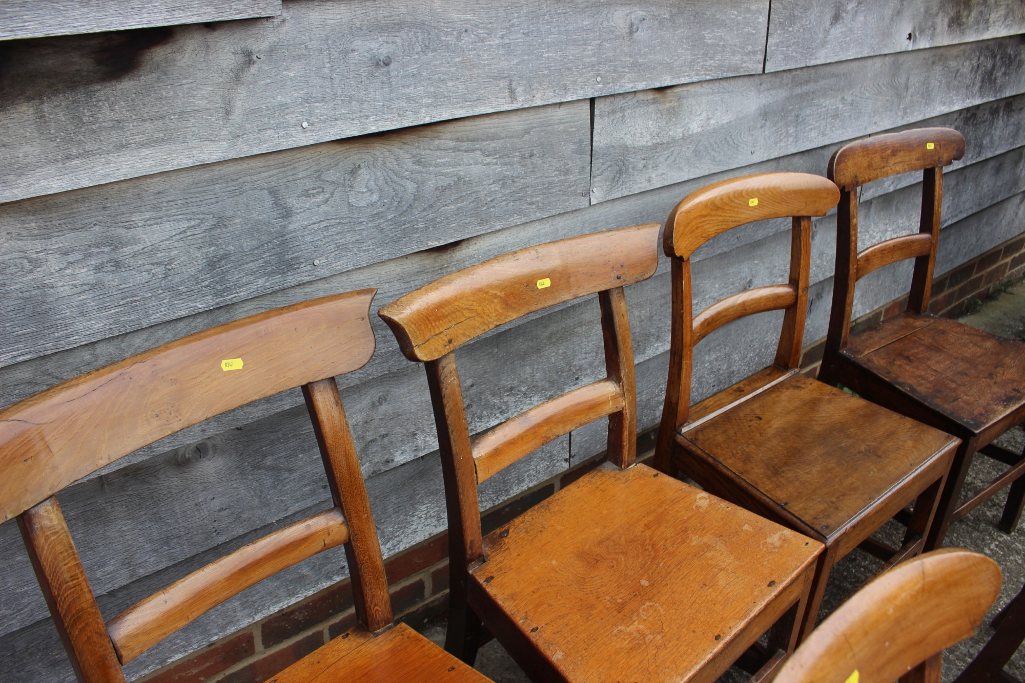 A Harlequin set of six 19th century oak bar back dining chairs with panel seats and stretchered - Image 3 of 3