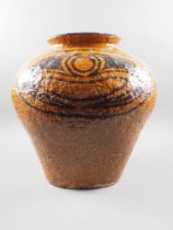 A 1960s studio pottery stoneware vase with abstract decoration and honey glaze, 18" high