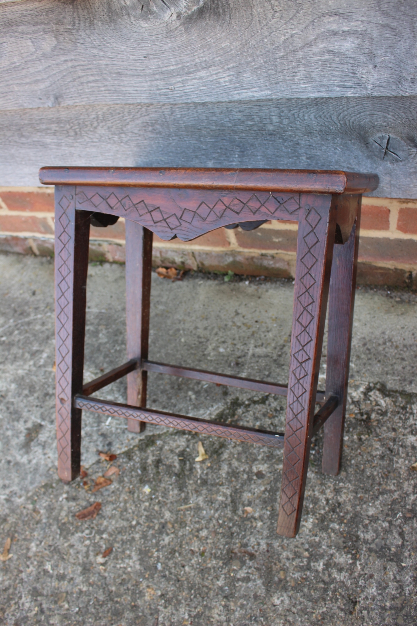 A 19th century carved oak stool/occasional table, on square taper supports, inscribed EH 1859, 17" - Image 3 of 3