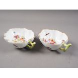A pair of Dresden porcelain floral decorated leaf shape cups, 4 3/4" wide