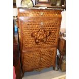 An early 19th century French kingwood parquetry and marquetry gilt metal mounted fall front