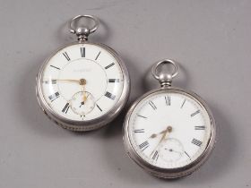 Two Victorian silver cased open faced pocket watches with white enamel dials and Roman numerals