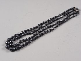 A haematite bead necklace, an iridescent bead necklace and other jewellery