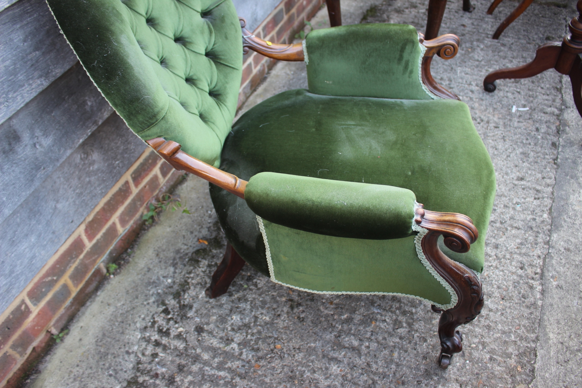 A Victorian button back deep seat open arm show frame chair, on cabriole supports - Image 2 of 2