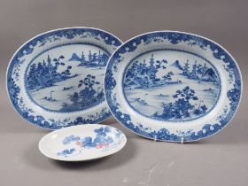 A pair of Chinese oval shaped platters with landscape decoration, 13 1/4" wide, and a similar oval