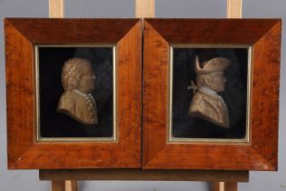 A pair of modern wax relief portraits, "John Paul Jones" and "Benjamin Franklin", 5 1/4" x 4 1/8",