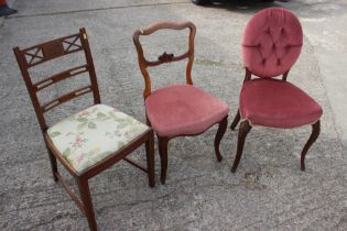 An Edwardian mahogany and inlaid side chair, a cameo back side chair and a Victorian walnut side