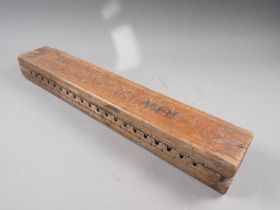 A L Bezemer & Zn Helmond Holland carved wood cigar press/mould No 6497, for 20 cigars, 22" long